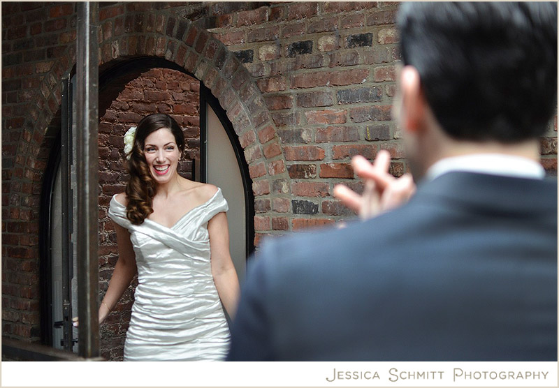 first-look-door-open-wedding bride and groom first look