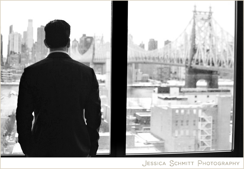groom-skyline-window-nyc-wedding-photography NYC groom looking out the window at the city skyline