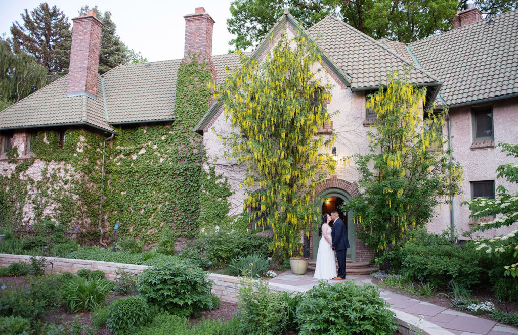bride and groom kissing at the Denver Botanic Gardens