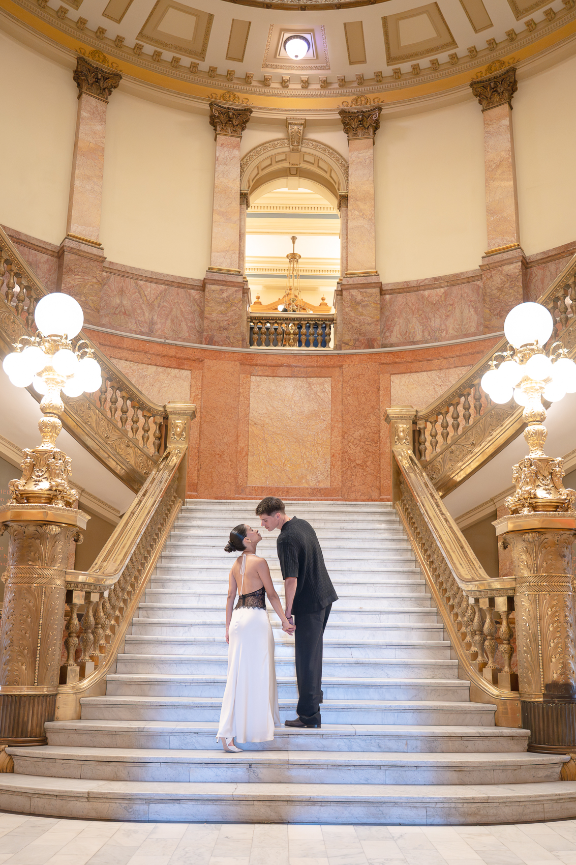 romantic staircase Colorado Capitol Building engagement photography