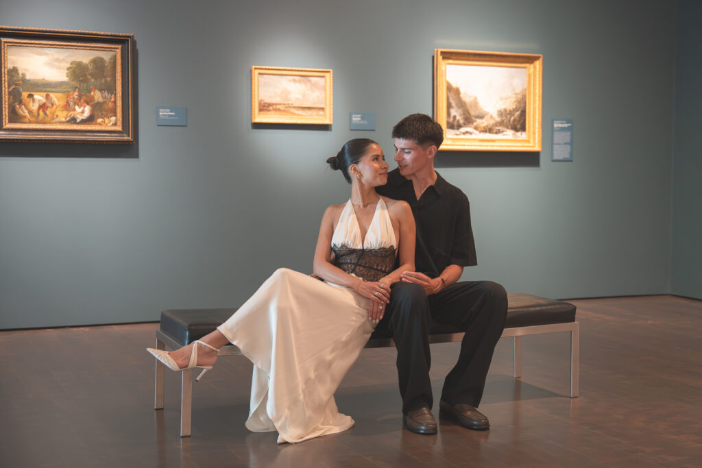 couple sitting in a gallery at denver art museum