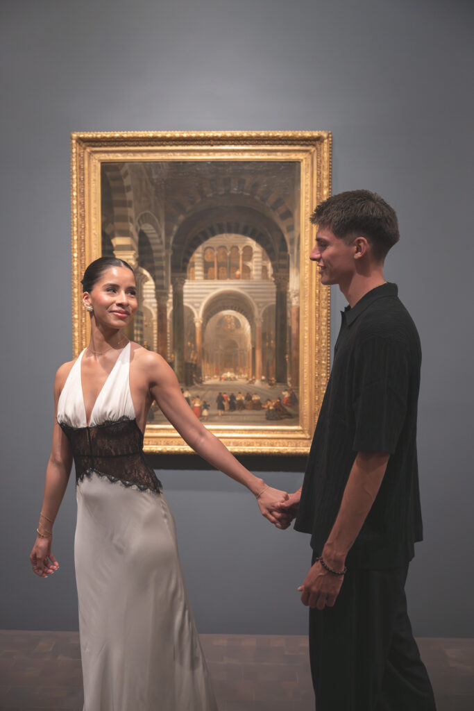 couple walk around denver museum of art