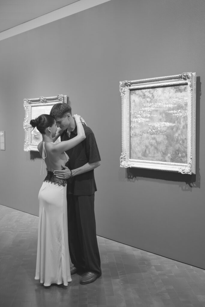 couple hugging in a gallery at denver museum of art
